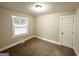 Cozy bedroom with neutral color and plush carpet at 2193 Polar Rock Sw Ave, Atlanta, GA 30315