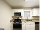 Stylish kitchen equipped with granite countertops, stainless appliances, and updated cabinetry at 2193 Polar Rock Sw Ave, Atlanta, GA 30315