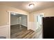 Open-concept living area featuring wood-look floors and neutral wall color at 2193 Polar Rock Sw Ave, Atlanta, GA 30315