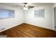 Bright bedroom featuring hardwood floors and two windows for ample natural light at 2537 Bonnybrook Sw Dr, Atlanta, GA 30311