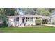 Charming single-story home with a well-maintained lawn, a welcoming entrance, and a convenient carport at 2544 Brentwood Rd, Decatur, GA 30032