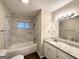 Updated bathroom with tiled shower, granite countertop, and modern fixtures at 2740 Bonnybrooke, Atlanta, GA 30311