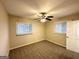 Bright bedroom featuring a ceiling fan, carpet, and windows at 2740 Bonnybrooke, Atlanta, GA 30311