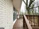 View of wood deck perfect for entertaining, with stairs and view of tree at 2740 Bonnybrooke, Atlanta, GA 30311