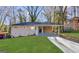 Charming single-story home with a covered carport and freshly painted exterior at 2740 Bonnybrooke, Atlanta, GA 30311