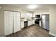 Kitchen featuring stainless steel appliances, white cabinetry and spacious flooring at 2740 Bonnybrooke, Atlanta, GA 30311