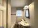 Bright bathroom with a new sink, subway tile backsplash and tile flooring at 2819 Gresham Rd, Atlanta, GA 30316