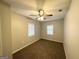 Cozy bedroom features neutral walls, ceiling fan and two windows with blinds at 2819 Gresham Rd, Atlanta, GA 30316