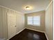 Cozy bedroom featuring refinished hardwood floors and updated paint at 2819 Gresham Rd, Atlanta, GA 30316