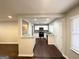 Open concept, modern kitchen with stainless steel appliances, white cabinetry and granite countertops at 2819 Gresham Rd, Atlanta, GA 30316