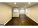 Bright living room featuring newly refinished hardwood floors and fresh paint at 2819 Gresham Rd, Atlanta, GA 30316