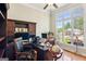 Bright office space features a large window with view of the surrounding neighborhood at 6410 E Hills Ct, Cumming, GA 30041