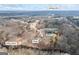 Aerial view of home with pool near Yellow River in Covington, GA, with easy access to US Hwy 278 at 50 Red River Ct, Covington, GA 30014