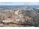 Aerial view of home with pool near Yellow River in Covington, GA, with easy access to US Hwy 278 at 50 Red River Ct, Covington, GA 30014