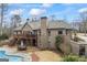 A lush backyard featuring a pool, patio, and multi-level deck, perfect for entertaining at 50 Red River Ct, Covington, GA 30014