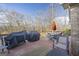 Expansive deck with a grill, dining set, and chairs, overlooking the yard at 50 Red River Ct, Covington, GA 30014