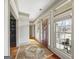 Foyer with hardwood floors, sidelight windows, and natural light at 50 Red River Ct, Covington, GA 30014
