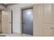 Hallway with a view of two doors, custom flooring and trim at 50 Red River Ct, Covington, GA 30014