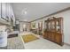 Spacious eat-in kitchen featuring stainless steel appliances, modern cabinets and a view into another room at 50 Red River Ct, Covington, GA 30014