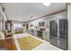 Spacious eat-in kitchen featuring stainless steel appliances, modern cabinets and a breakfast area at 50 Red River Ct, Covington, GA 30014