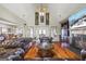 Bright living room boasting a fireplace, hardwood floors, and stylish decor at 50 Red River Ct, Covington, GA 30014