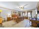 Primary bedroom with a four-poster bed, wood trim, and carpet flooring at 50 Red River Ct, Covington, GA 30014