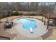 Aerial view of an inground pool, patio and pergola in the backyard at 50 Red River Ct, Covington, GA 30014