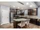 Spacious kitchen island with granite countertops and stainless steel appliances, great for entertaining at 121 Amelia Way, Ellenwood, GA 30294