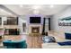 Bright and airy living room with a fireplace and contemporary decor at 121 Amelia Way, Ellenwood, GA 30294