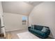 This living room has a cozy blue sofa, carpeted floors and offers a great view from the window at 121 Amelia Way, Ellenwood, GA 30294