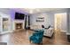 Inviting living room featuring a cozy fireplace and stylish furniture arrangement at 121 Amelia Way, Ellenwood, GA 30294