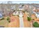 Aerial view of home featuring manicured landscaping and a two-car garage at 506 Olivia Ct, Stockbridge, GA 30281
