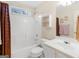 Bathroom featuring a combined tub and shower, toilet, and vanity with mirror at 506 Olivia Ct, Stockbridge, GA 30281