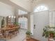 Inviting dining area with natural light, chandelier, and ample space for entertaining at 506 Olivia Ct, Stockbridge, GA 30281