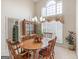 Inviting dining area with natural light, chandelier, and ample space for entertaining at 506 Olivia Ct, Stockbridge, GA 30281