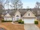 Charming single-Gathering home with manicured lawn, two-car garage and traditional architectural style at 506 Olivia Ct, Stockbridge, GA 30281