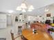 Open-concept living room includes dining area and breakfast bar at 506 Olivia Ct, Stockbridge, GA 30281