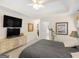 Spacious main bedroom features a tray ceiling and a large closet at 506 Olivia Ct, Stockbridge, GA 30281
