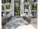 Stately condo building with a secure, private gated entrance at 2119 Pine Heights Ne Dr, Atlanta, GA 30324