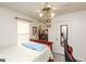 Bedroom featuring light-colored walls, a ceiling fan, and wood-look flooring at 417 River Trace Dr, Villa Rica, GA 30180