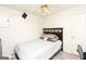 Bedroom featuring gray wood-look flooring and a black headboard at 417 River Trace Dr, Villa Rica, GA 30180