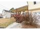 Inviting front porch featuring a covered area with seating, a wooden deck and staircase at 417 River Trace Dr, Villa Rica, GA 30180