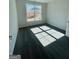 Sunlit bedroom features plush carpeting and a large window, creating a bright and inviting space at 3392 Milan Ct # 2 Plapprox Sqft 3, Douglasville, GA 30135