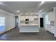 Spacious kitchen with granite countertops, white cabinets, and a large island, perfect for entertaining at 3392 Milan Ct # 2 Plapprox Sqft 3, Douglasville, GA 30135