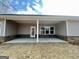 Covered patio with concrete floor, white columns, and brick facade at 3392 Milan Ct # 2 Plapprox Sqft 3, Douglasville, GA 30135