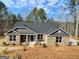 Beautiful new construction home with brick and siding exterior and a dark roof at 3392 Milan Ct # 2 Plapprox Sqft 3, Douglasville, GA 30135