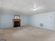 This is a basement living area with a fireplace at 445 Turner Dr, Mcdonough, GA 30252