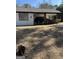 View of the carport, showcasing covered parking with a car parked inside at 1125 Carlo Sw Ct, Atlanta, GA 30331