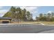 Paved community parking area adjacent to the tennis and basketball courts at 1033 Claas Way, Locust Grove, GA 30248