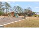 Enjoy outdoor fun at the community playground featuring a swing set, slide, and climbing structure at 234 Thorne Wood Ln, Hampton, GA 30228